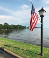 An American flag hangs from a lightpole along Edenton Bay in Edenton, NC.
